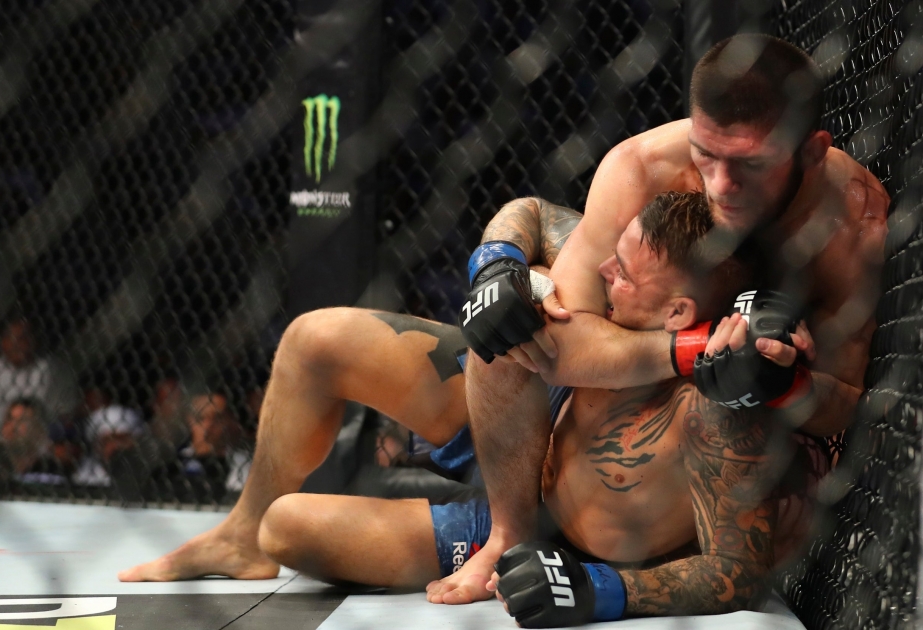 Khabib Nurmagomedov beats Dustin Poirier to defend UFC lightweight title