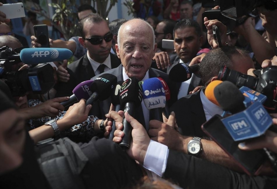 Exit polls project Saied to become Tunisia's new president