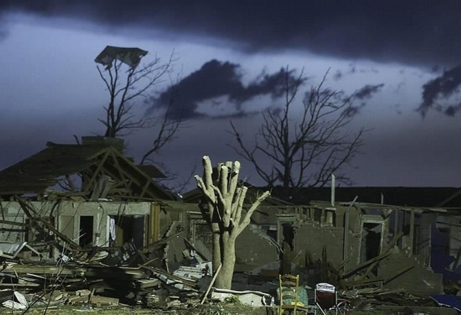 Tornadoes tear through US south, killing three