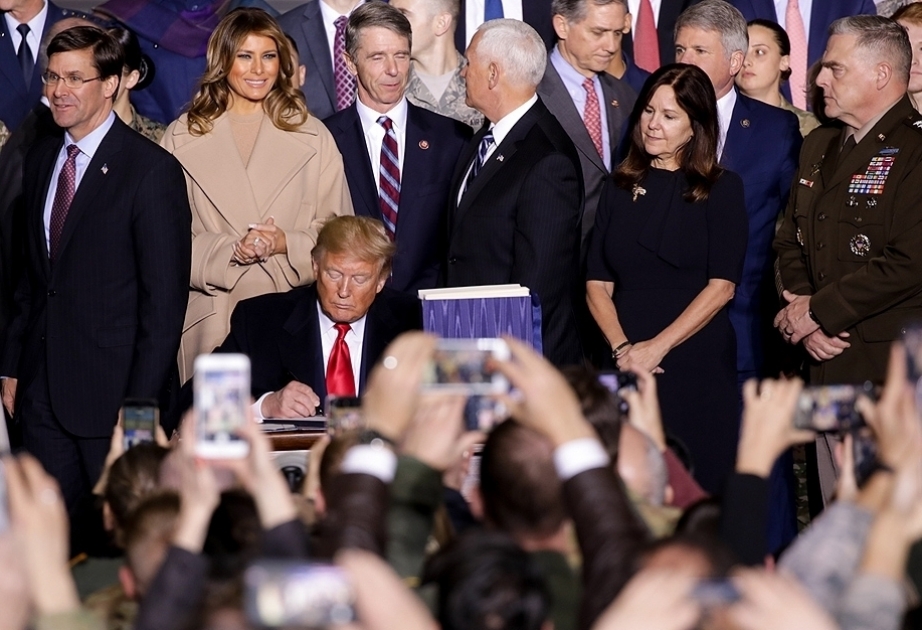 Trump touts $738B defense spending bill