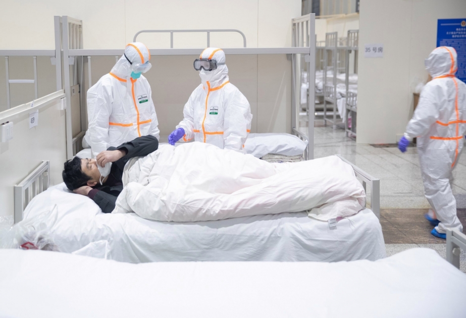 Death toll in China’s coronavirus outbreak rises to 723
