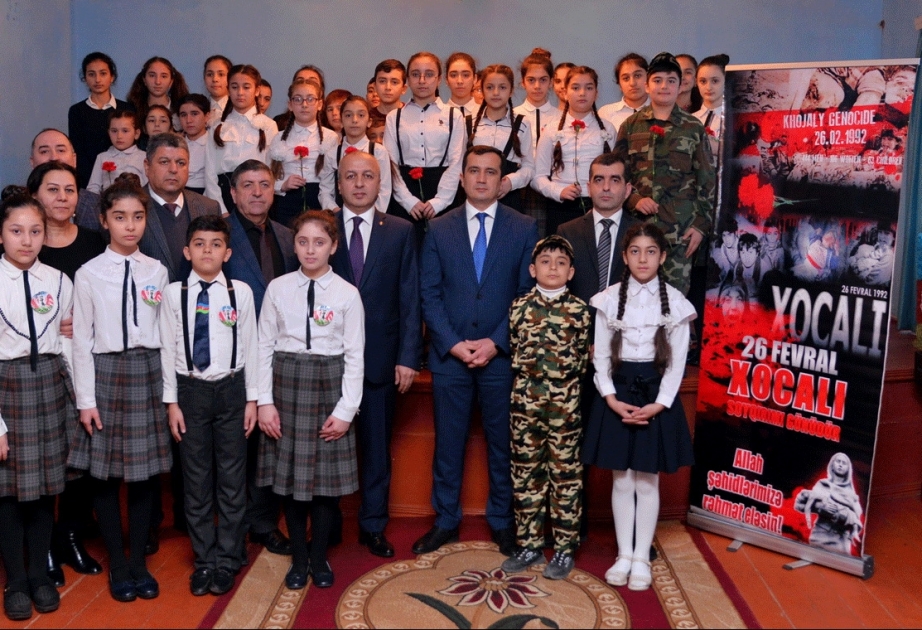 Məktəblilərin rəsm sərgisi: Xocalı soyqırımı tarixin qan yaddaşıdır