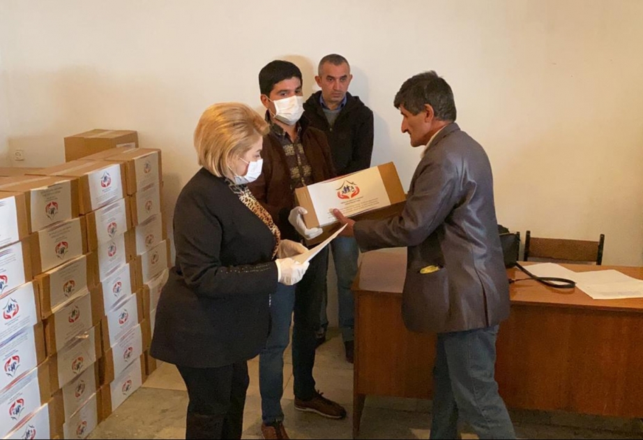 Şəkidə aztəminatlı ailələrə ərzaq yardımı edilib