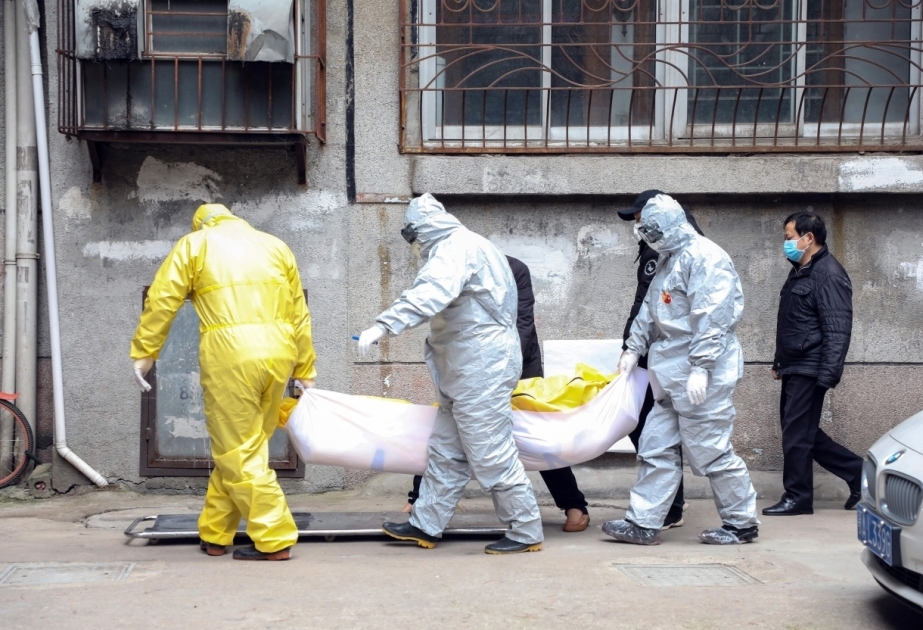 China revises Wuhan death toll by nearly 1,300
