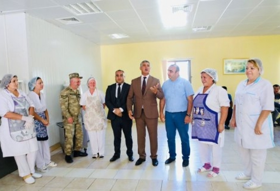 İdman ictimaiyyətinin nümayəndələri cəbhə bölgəsində əsgərlərlə görüşüblər