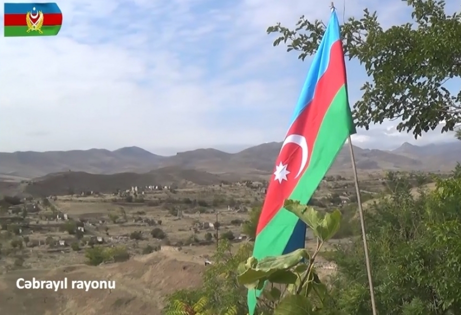 Azerbaijani flag waving in liberated from occupation territories of Jabrayil