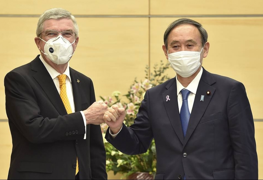 Премьер Японии и глава МОК убеждены, что Олимпиада пройдет в срок, несмотря на пандемию