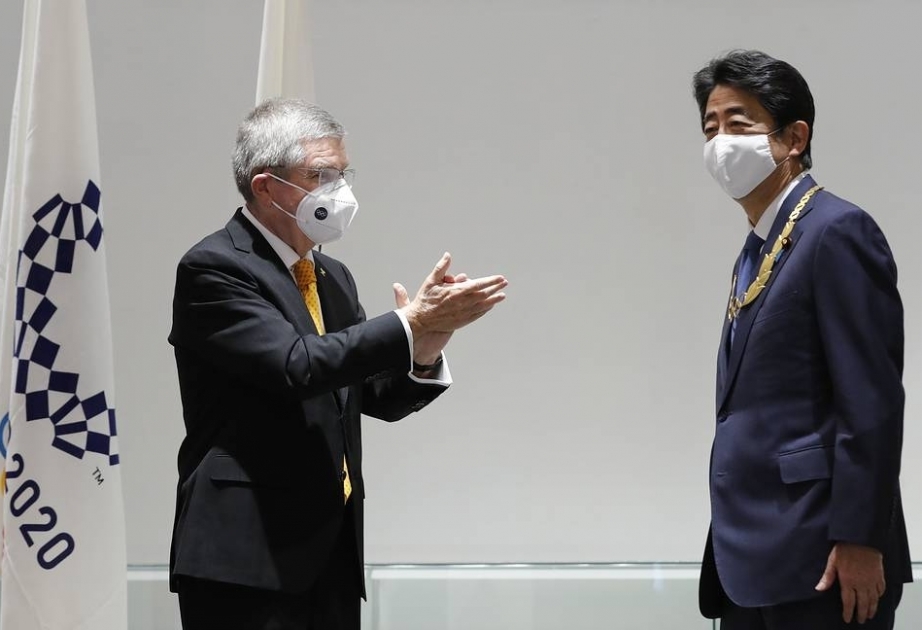 El ex primer ministro japonés recibió la Orden Olímpica
