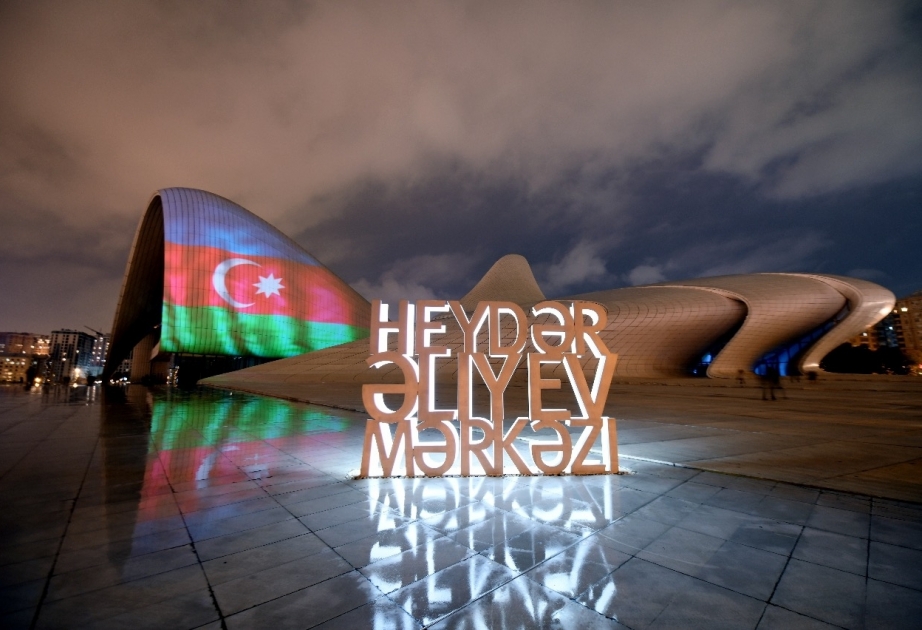 Heydar Aliyev Center, Flame Towers and Baku Olympic Stadium lit up with colors of Azerbaijani flag in commemoration of Patriotic War martyrs
