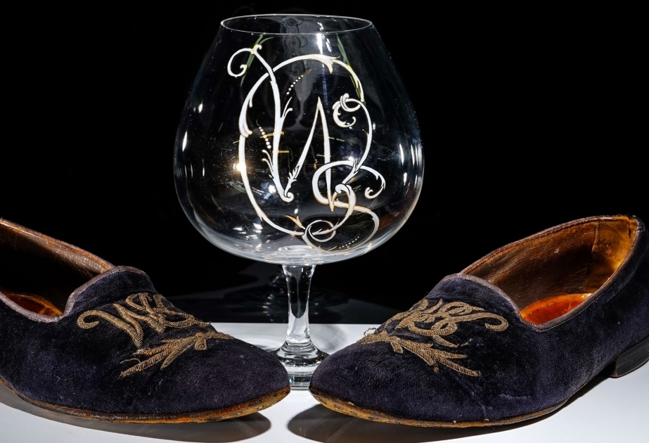 Winston Churchill's velvet slippers fetch nearly £40,000