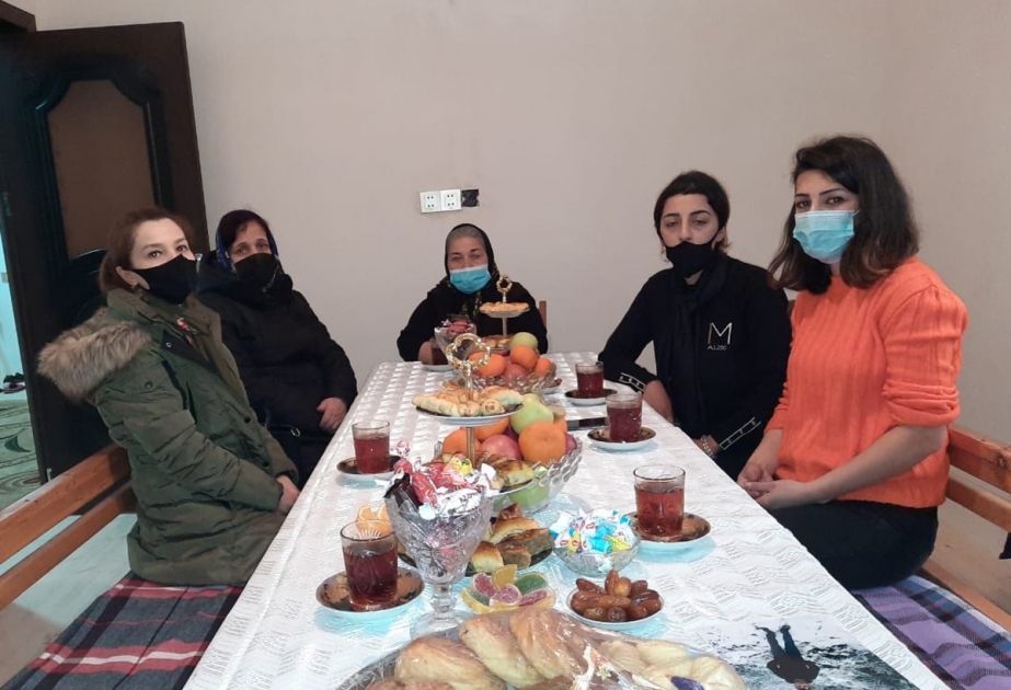 Oğuz rayon Heydər Əliyev Mərkəzinin kollektivi şəhid ailəsini ziyarət edib