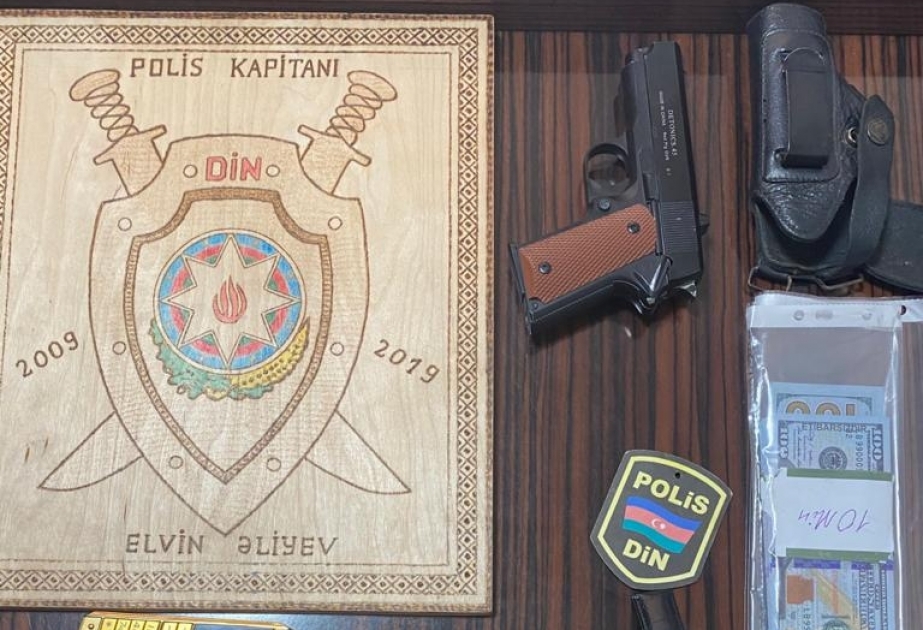 Özünü polis əməkdaşı kimi təqdim edərək qadına hədə-qorxu gələn şəxs saxlanılıb VİDEO