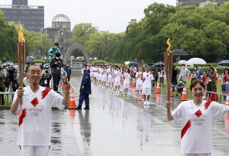 Downscaled Olympic torch relay held in Hiroshima amid COVID surge