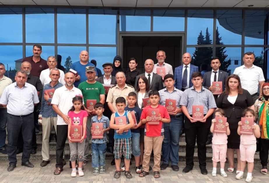 Şəhidlərin xatirəsinə həsr olunmuş kitab Milli Qurtuluş Günündə şəhid ailələrinə təqdim edilib