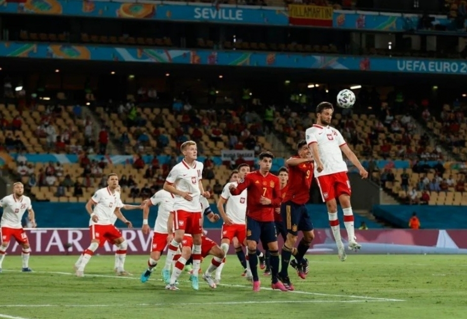 Poland draw 1-1 with Spain, keep last 16 chances alive
