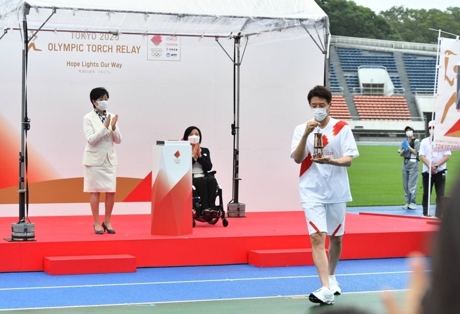 Olympic Torch relay reaches Tokyo but amid COVID-19 restrictions lacks usual fanfare