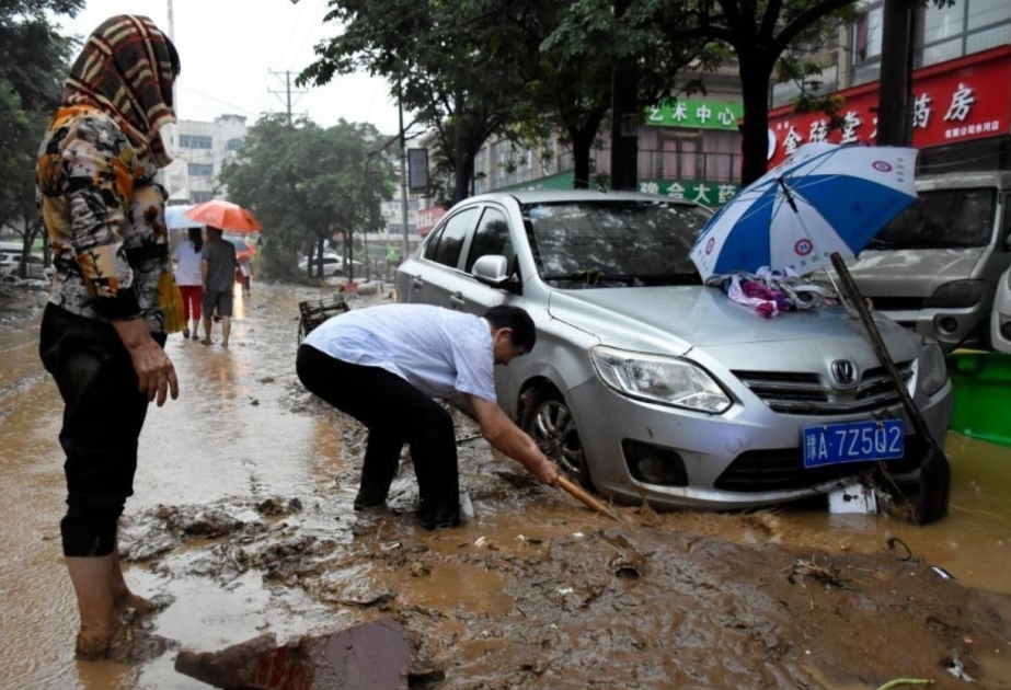 Death toll in China floods rises to 33, 8 missing