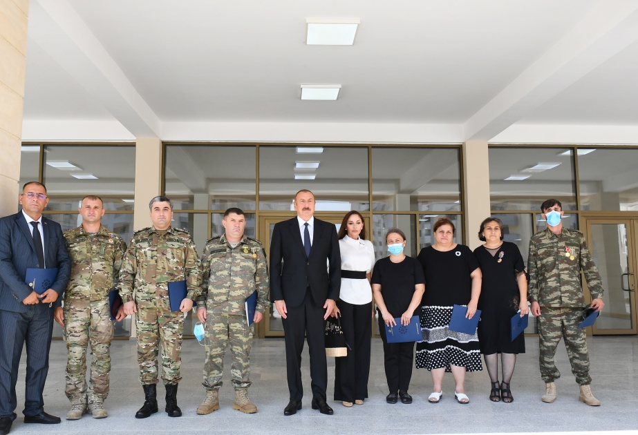 Families of martyrs, war disabled and heroes of Patriotic War were presented with apartments and cars  President Ilham Aliyev and First Lady Mehriban Aliyeva attended the ceremony VIDEO