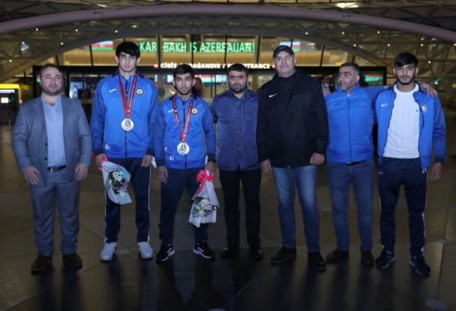 Dünya çempionatında uğur qazanan gənc cüdoçular Vətənə dönüblər