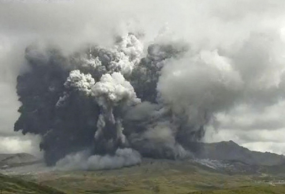 Japanese volcano spews plumes of ash, people warned away