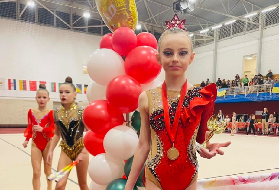On bir yaşlı gimnast Budapeştdə qazandığı qələbəsini Zəfər Günümüzə həsr edib VİDEO