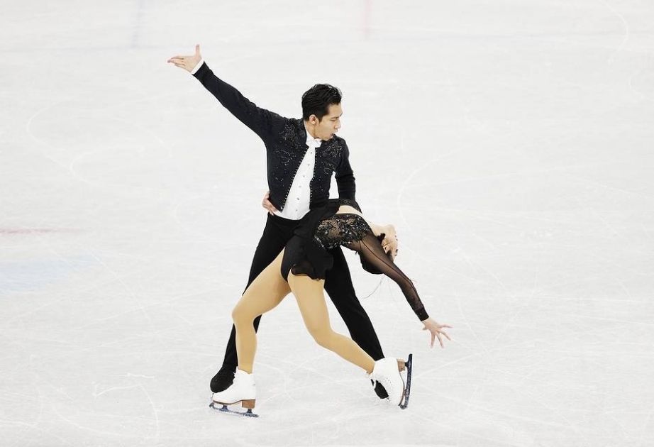 China’s Sui Wenjing, Han Cong set new world record in ice skating pair short program