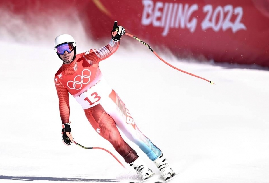 Beat Feuz wins Olympic downhill, completes career collection