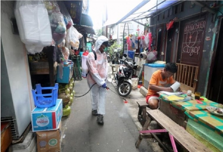 Indonesia to tighten COVID curbs as infections climb