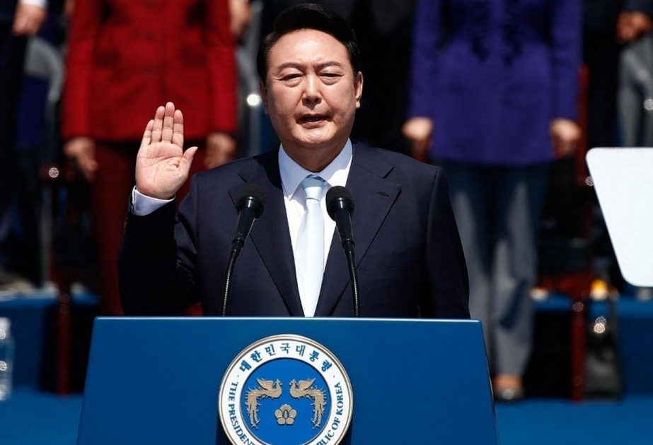 South Korea's Yoon takes office, offers help to a denuclearized North