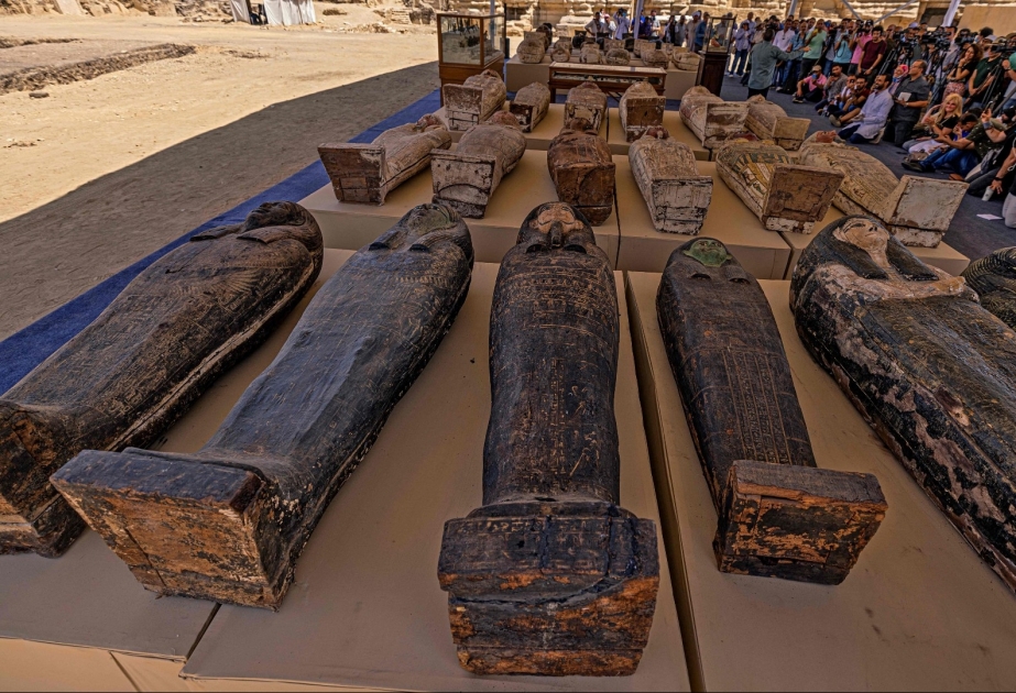 Hundreds of ancient Egyptian sarcophagi, cat mummies and gold-leafed statues unearthed at necropolis