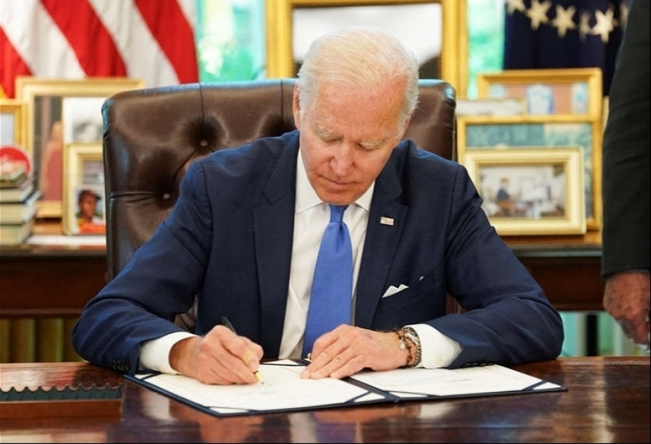 Joe Biden signs into law landmark gun control bill
