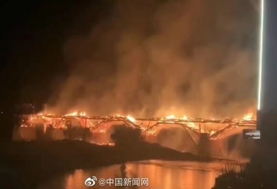 Ancient wooden bridge engulfed by blaze in China