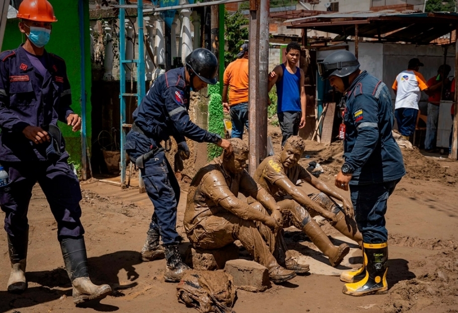 Venezuela crews search for missing as landslide death toll rises