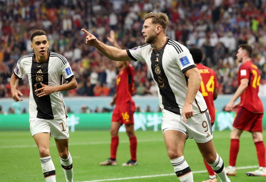 Germany tie with Spain to keep World Cup dreams alive