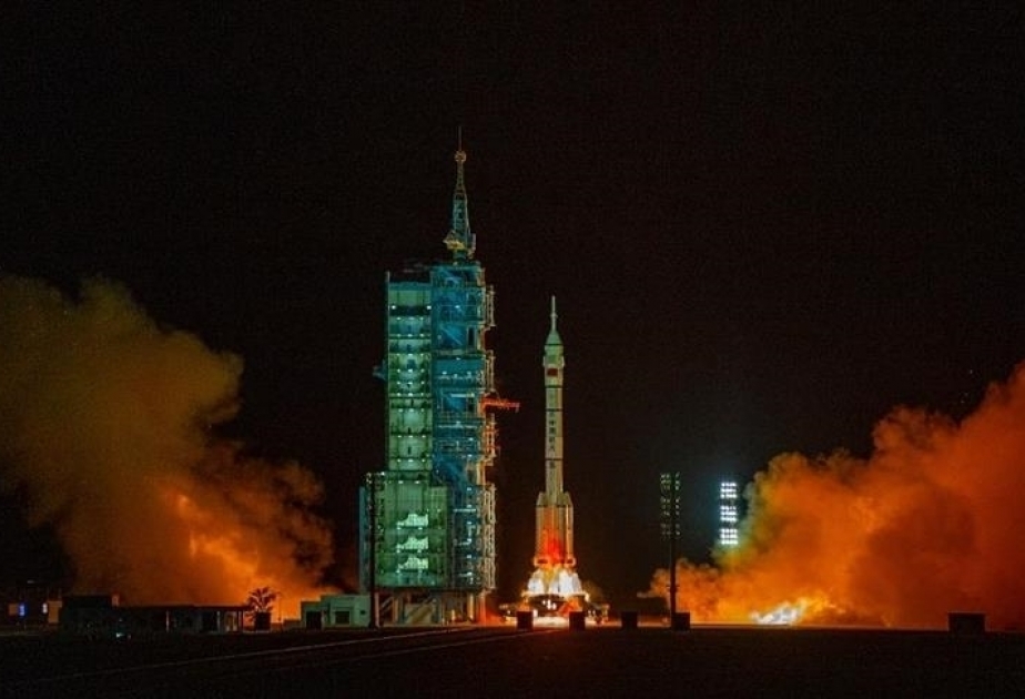 After return from space, Chinese astronauts arrive in capital Beijing