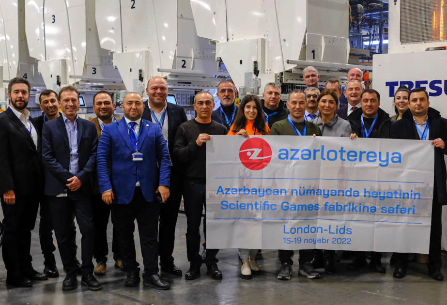 ®  Media representatives at factory where "Poz-Qazan" tickets are printed in England