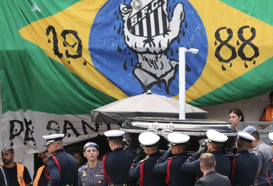 Brazilian football great Pele buried after huge procession