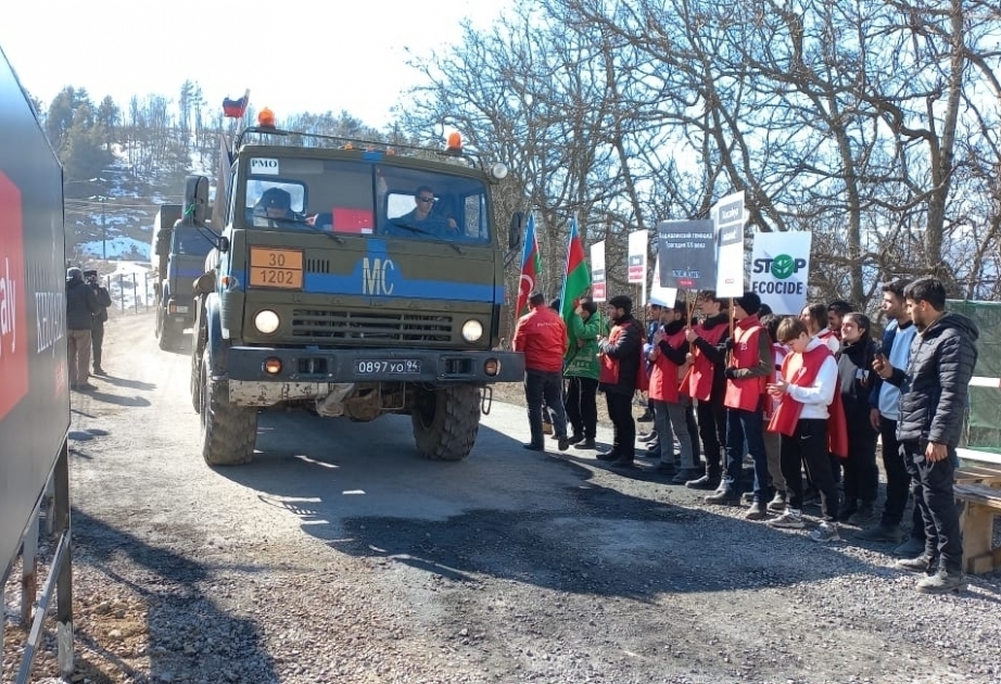 Russian peacekeepers` vehicles pass freely through protest area