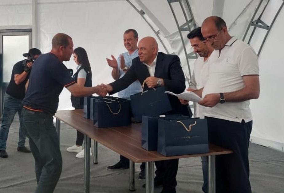 Laçına qayıdan ailələrə evlərinin açarları verilib
