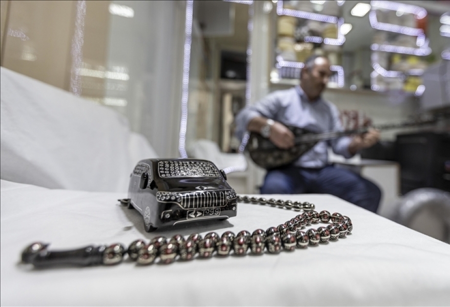 Ərzurumlu usta TOGG elektromobilinin daşdan maketini yonub