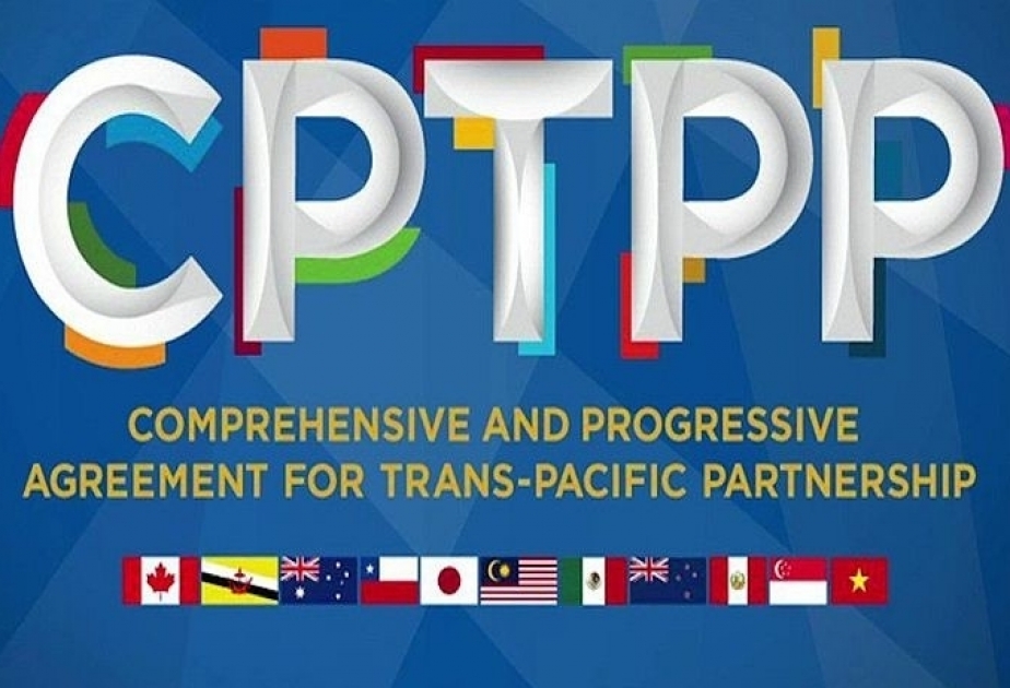Britain officially joins an Asia-Pacific trade group that includes Japan and 10 other nations
