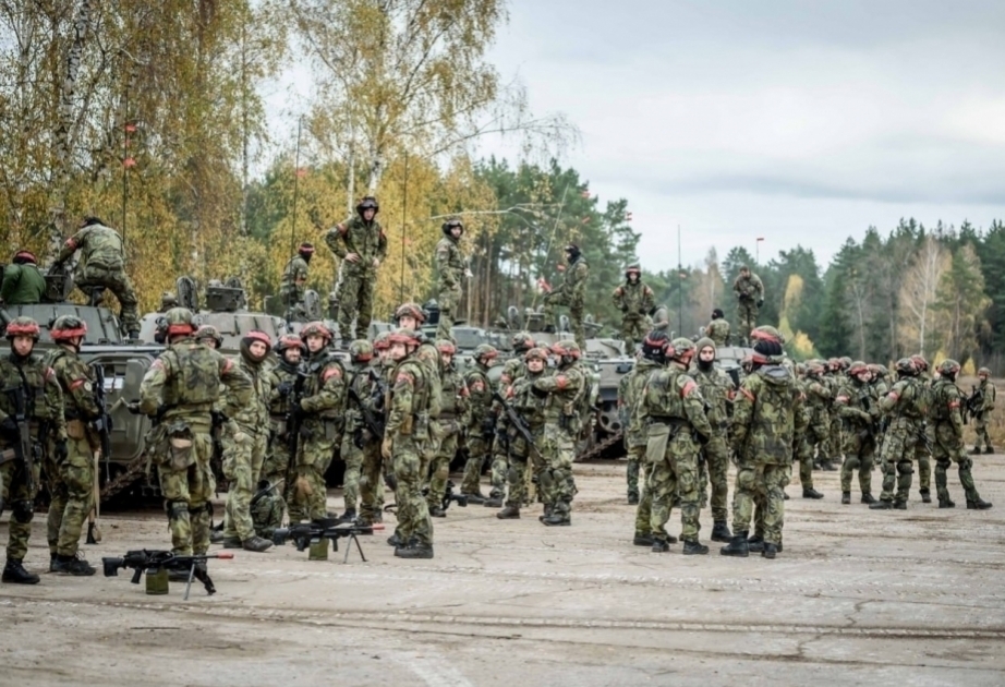 Poland plans to send up 10,000 soldiers to border with Belarus