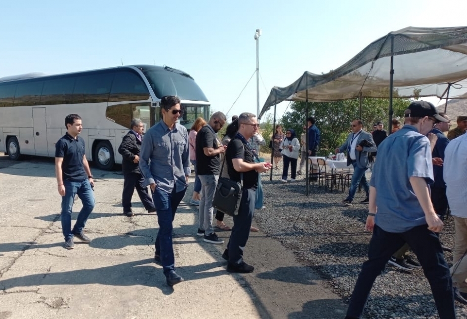 Representatives of diplomatic corps, military attachés, foreign journalists arrive on Aghdam-Khankendi road