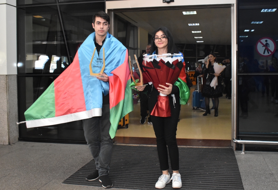 Azerbaijan`s world chess champions return home