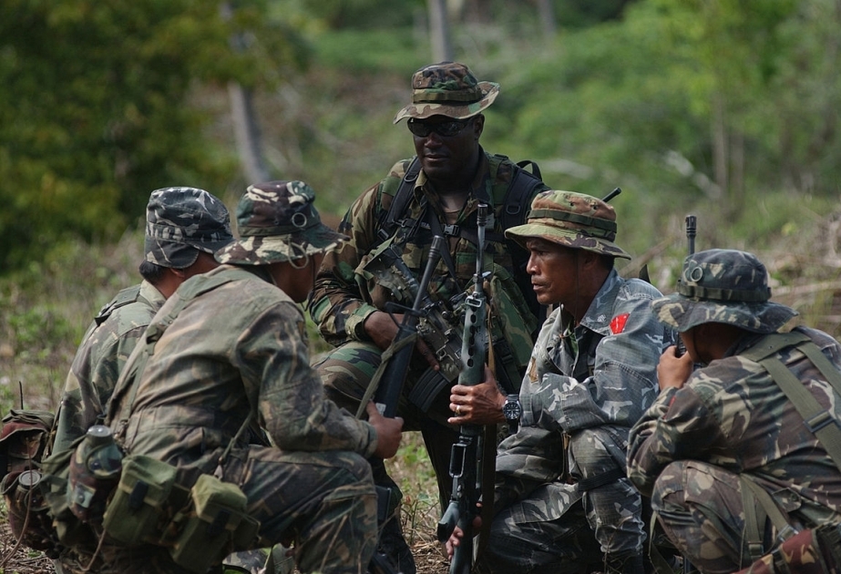 Troops kill 11 extremists in clash in southern Philippines