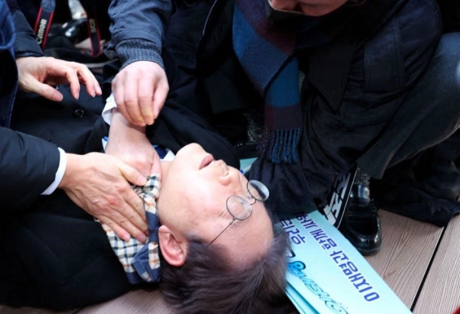 South Korean opposition leader conscious after being stabbed in the neck