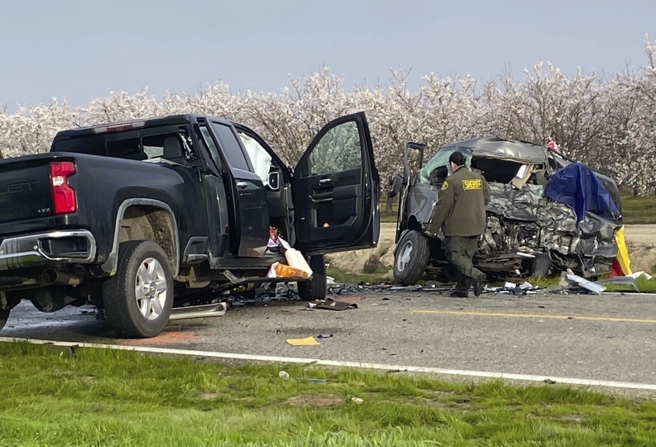 Eight people are killed in horror crash on California highway after van collides with pick-up truck