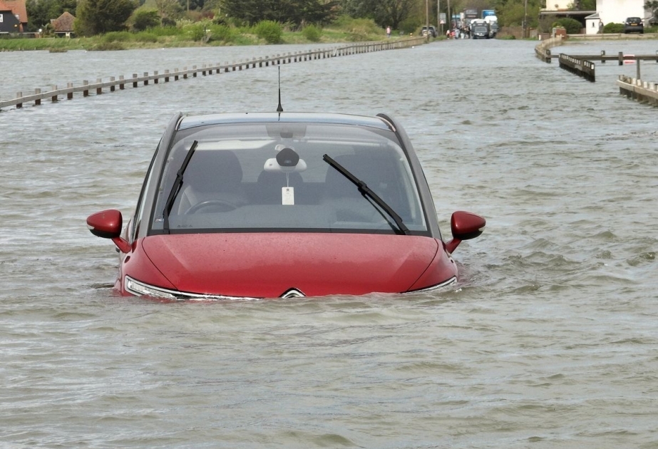 Hundreds evacuated from holiday park as flooding and rain batters south west coast of UK