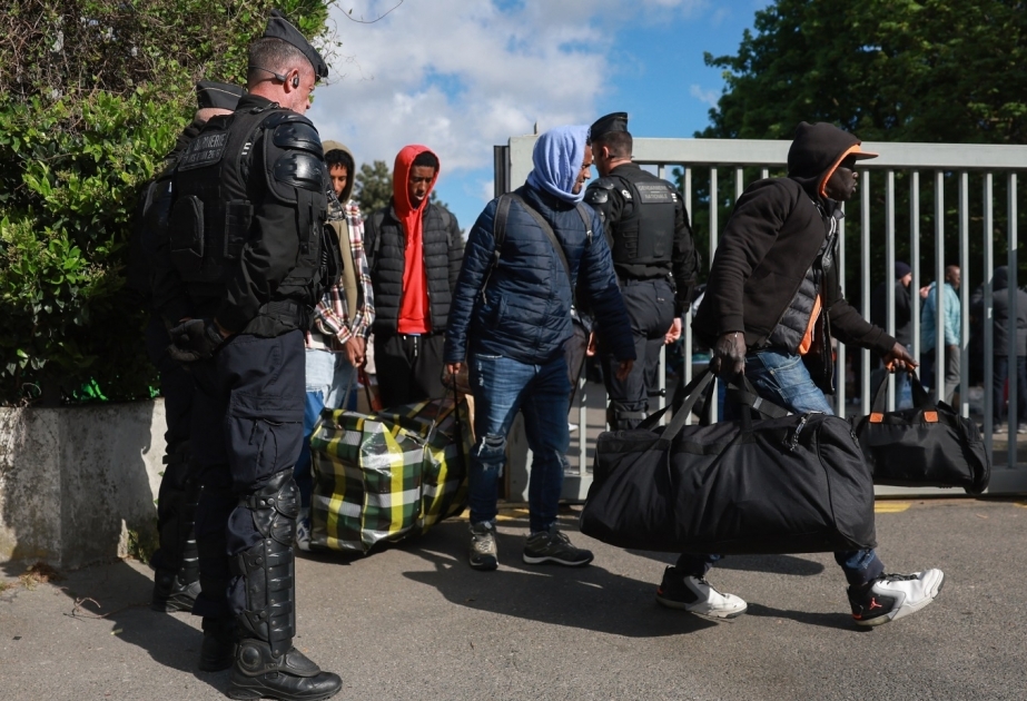 French police evict hundreds from abandoned Paris warehouse ahead of Olympics
