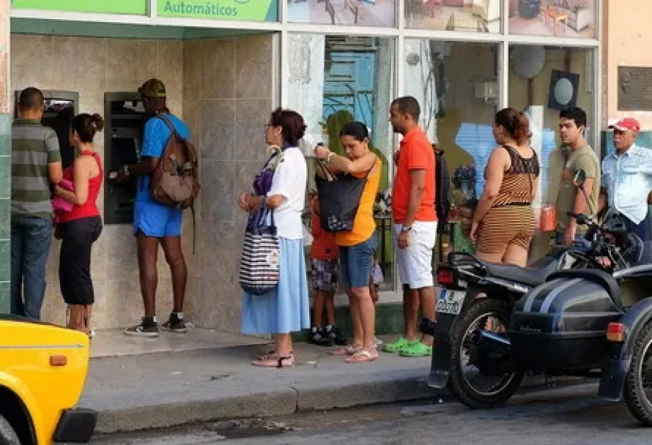 Long lines form and frustration grows as Cuba runs short of cash